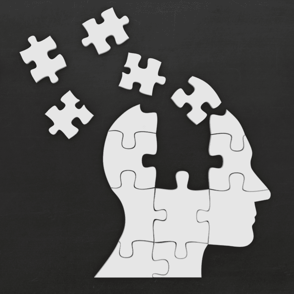 White head silhouette created with puzzle pieces